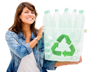 Woman holding a recycle bin - isolated over a white background